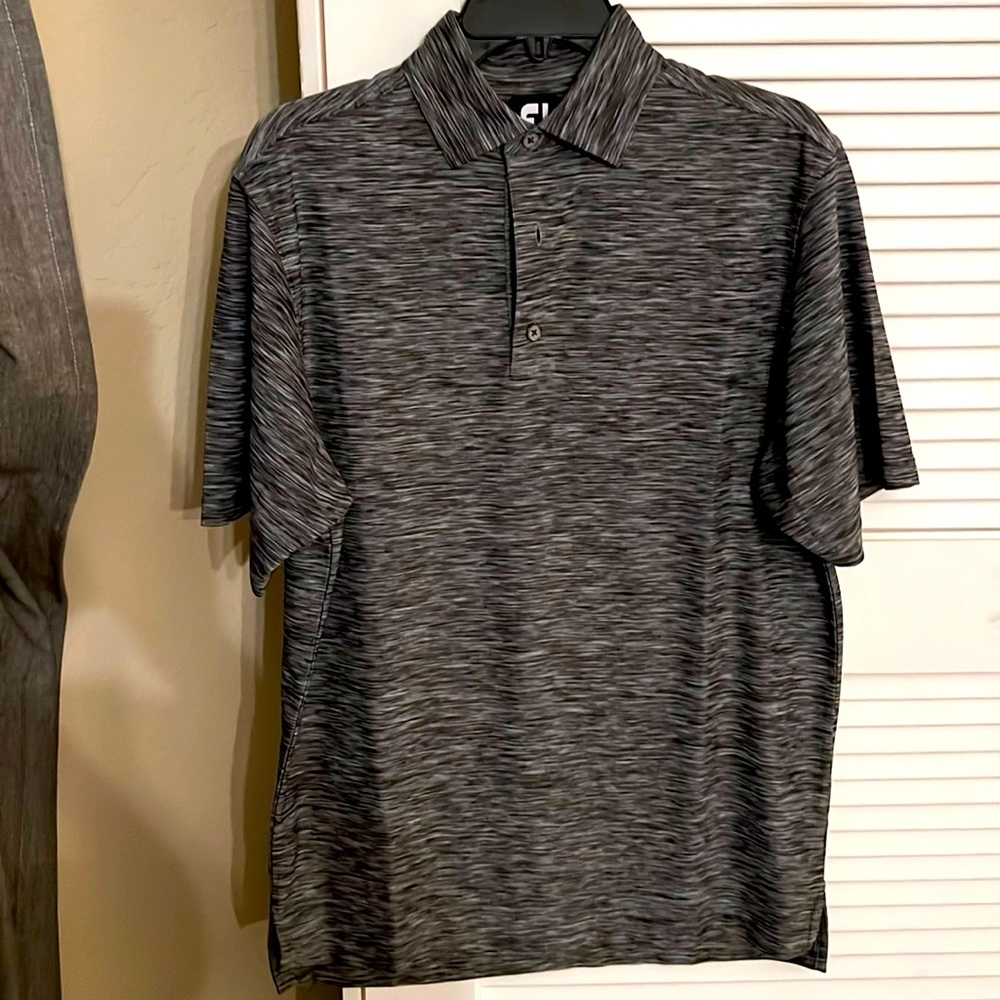 Grey Foot-joy shirt golf ready.